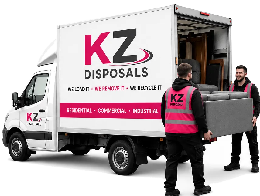 Two KZ Disposal team members loading a sofa into the KZ box van